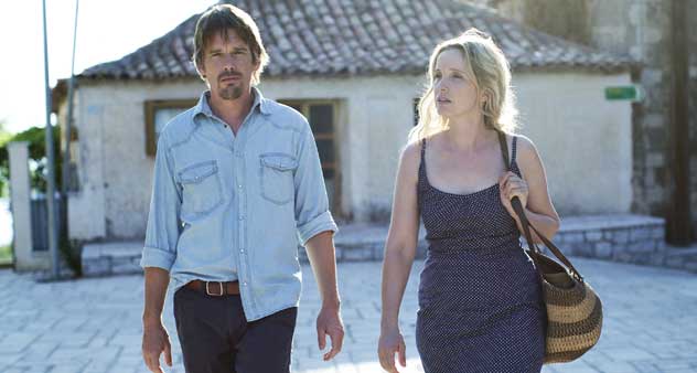 Ethan Hawke and Julie Delpy take a walk in Before Midnight