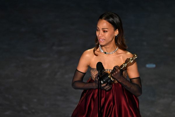 US actress Zoe Saldana accepts the award for Best Actress in a Supporting Role for "Emilia Perez" onstage during the 97th Annual Academy Awards at the Dolby Theatre in Hollywood, California on March 2, 2025. (Photo by Patrick T. Fallon / AFP) (Photo by PATRICK T. FALLON/AFP via Getty Images)